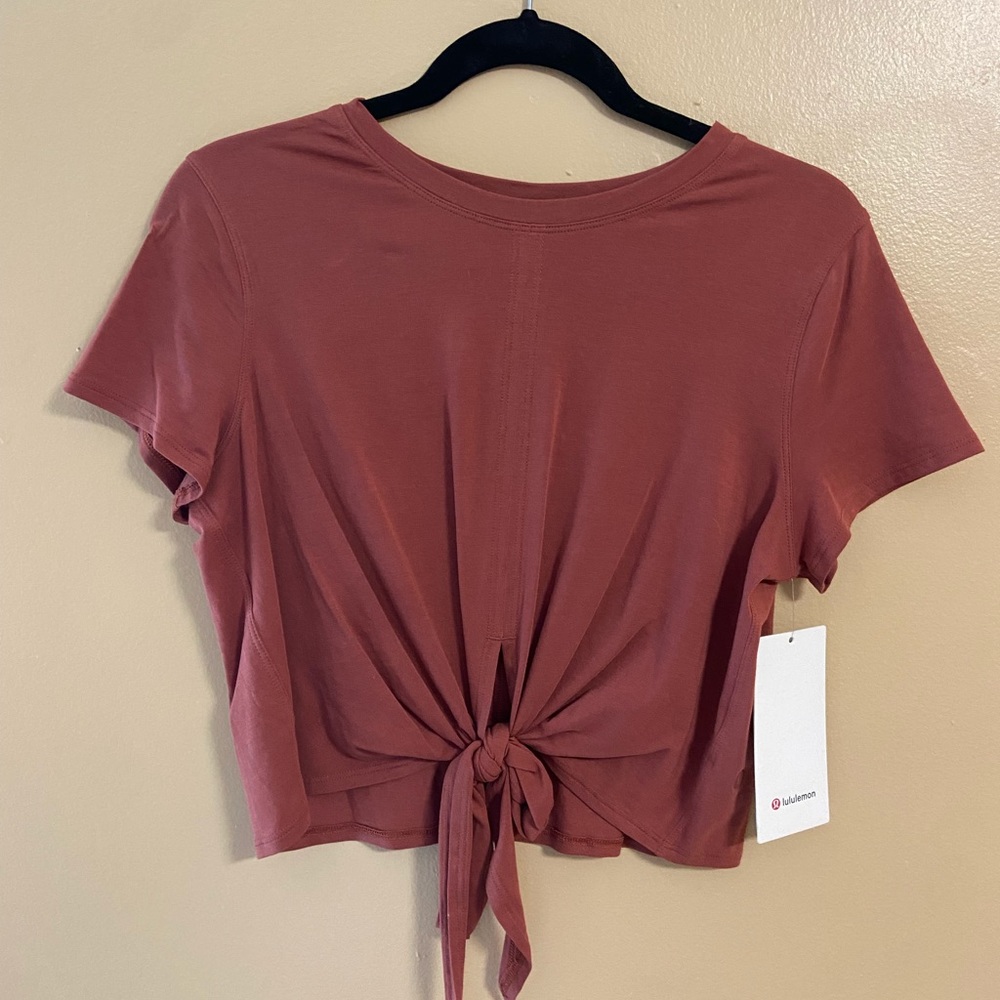 Dusty orange Lulu Lemon Time To Restore tie top.